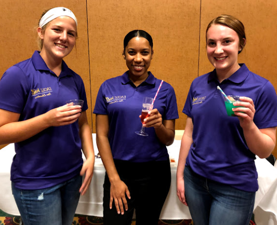 Three students participating in the Mocktail Mix-Off